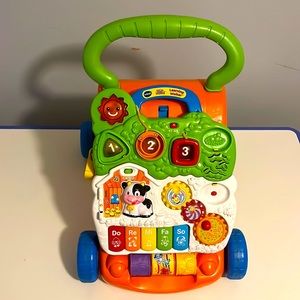 VTech Sit-to-Stand Learning Walker (Frustration Free Packaging) , Orange